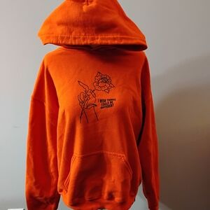 Orange Graphic Hoodie with Floral Line Art